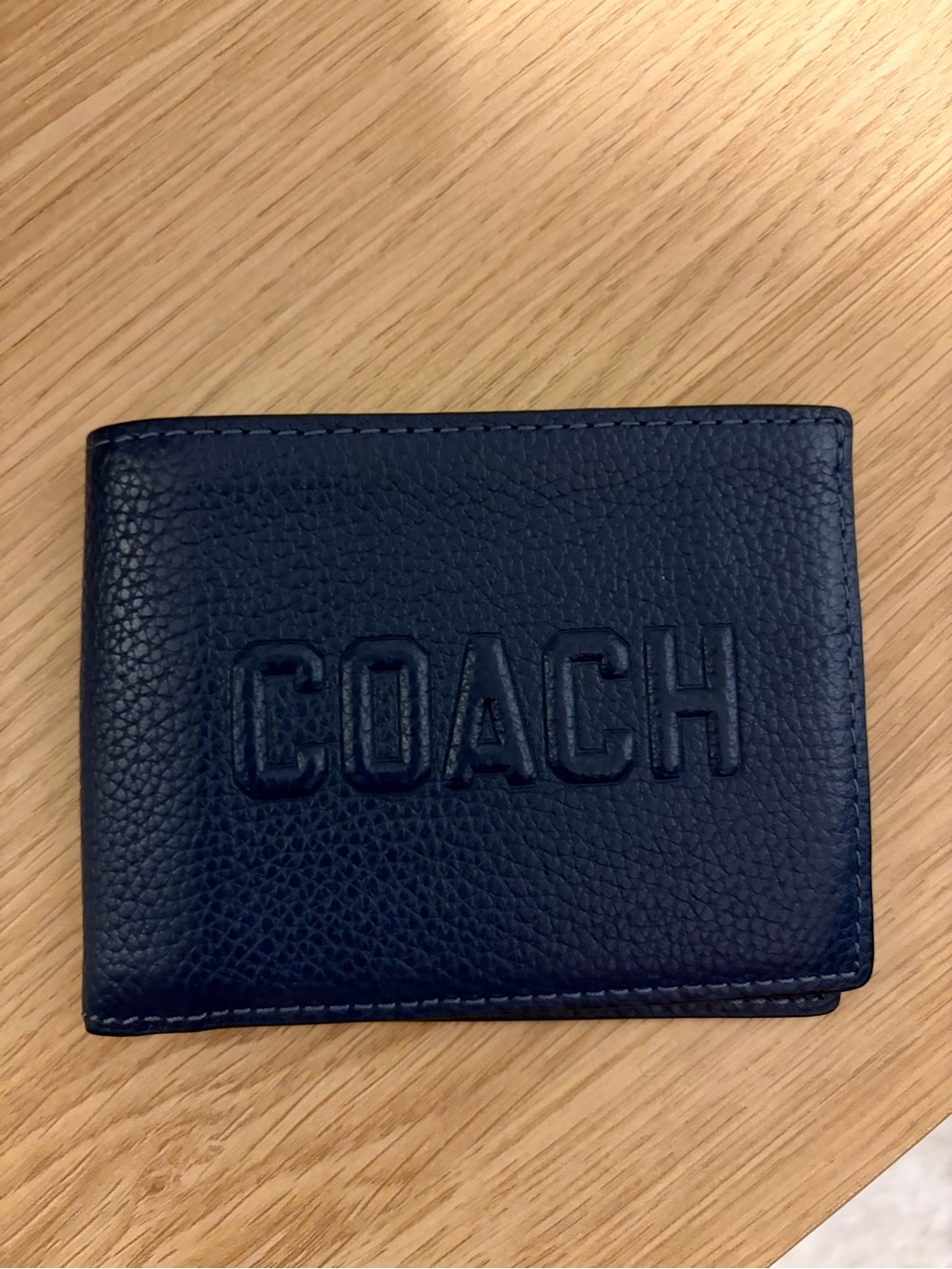 Coach Navy Pebbled Leather Bi-Fold Wallet